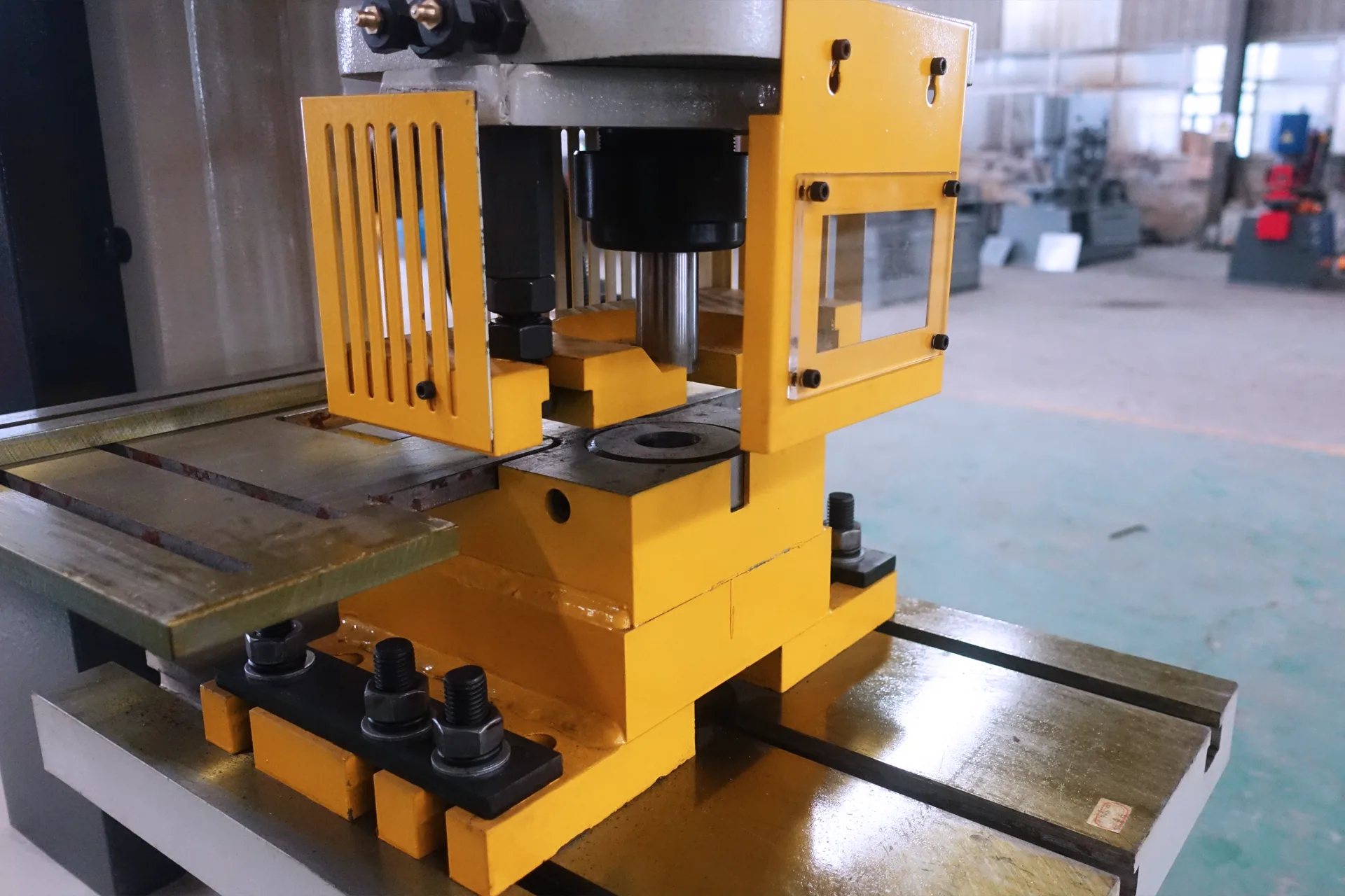 Affordable Ironworker Machine for small workshops, Hydraulic Ironworker Machine with multiple stations - Pictures 10 Affordable Ironworker Machine for small workshops, Hydraulic Ironworker Machine with multiple stations - punching station
